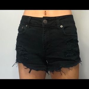 Black American eagle ripped jean shorts